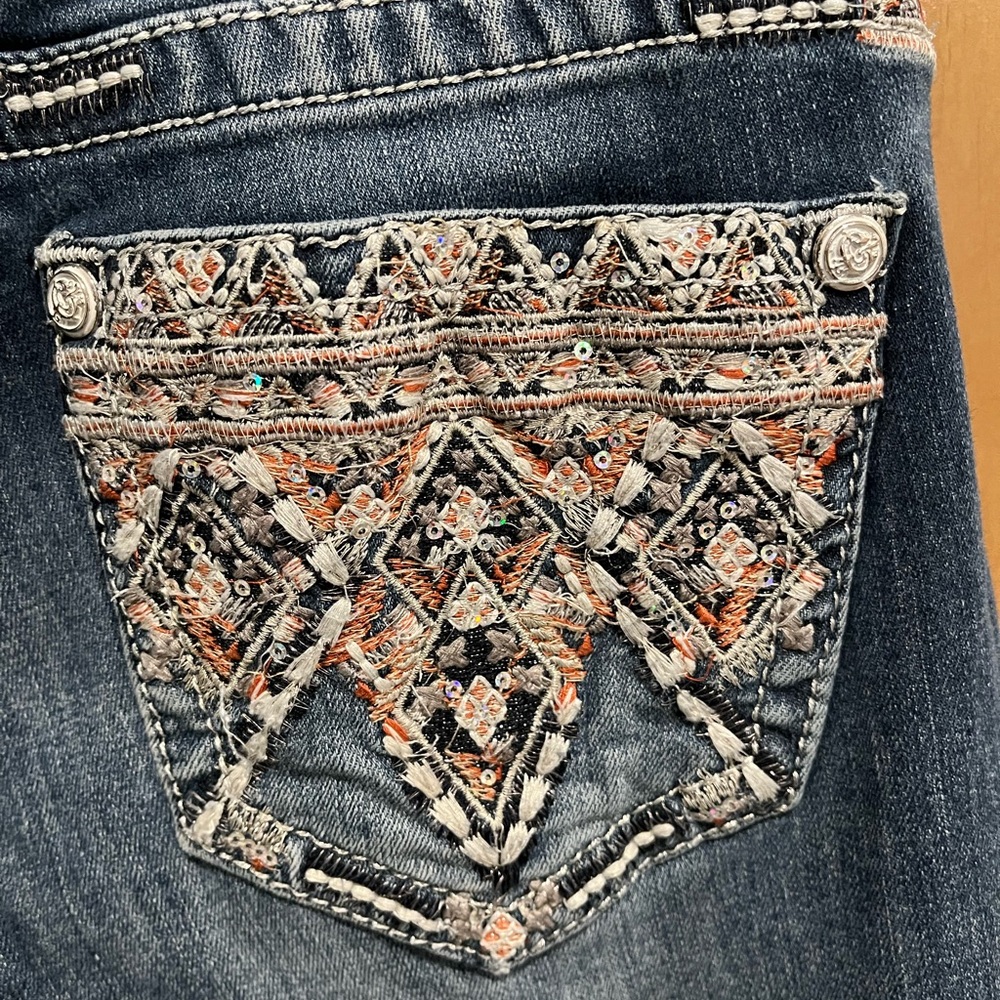Grace in LA Blue Jeans with Orange Embroidery